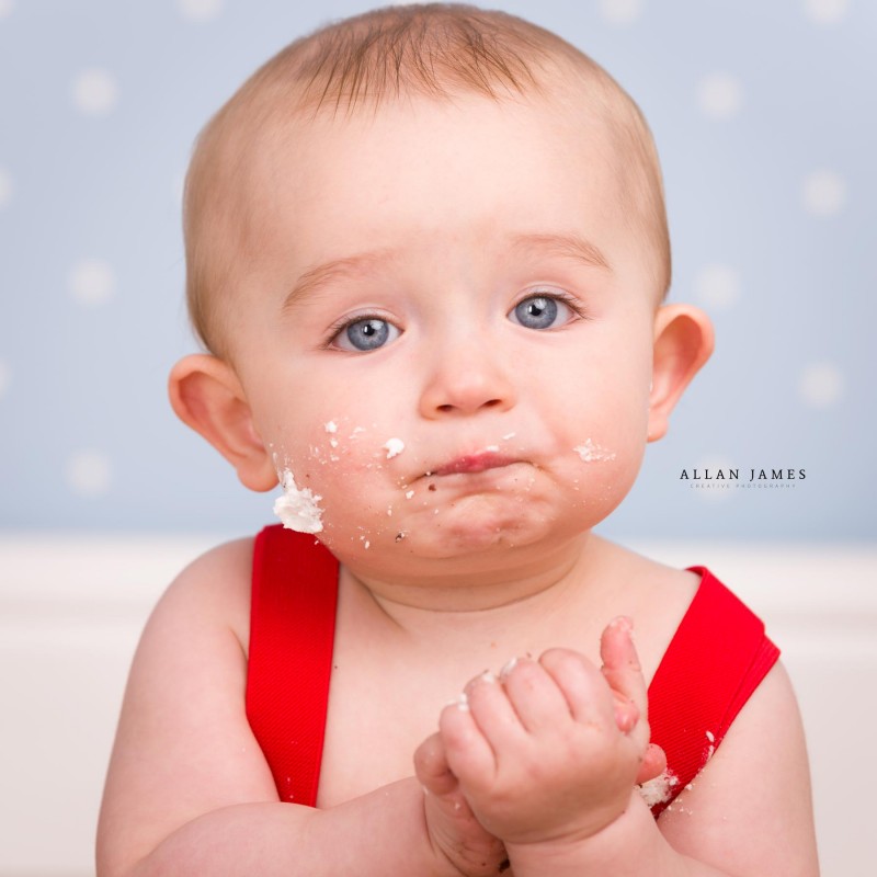 Cute cake smash photographer bridgend south wales cardiff